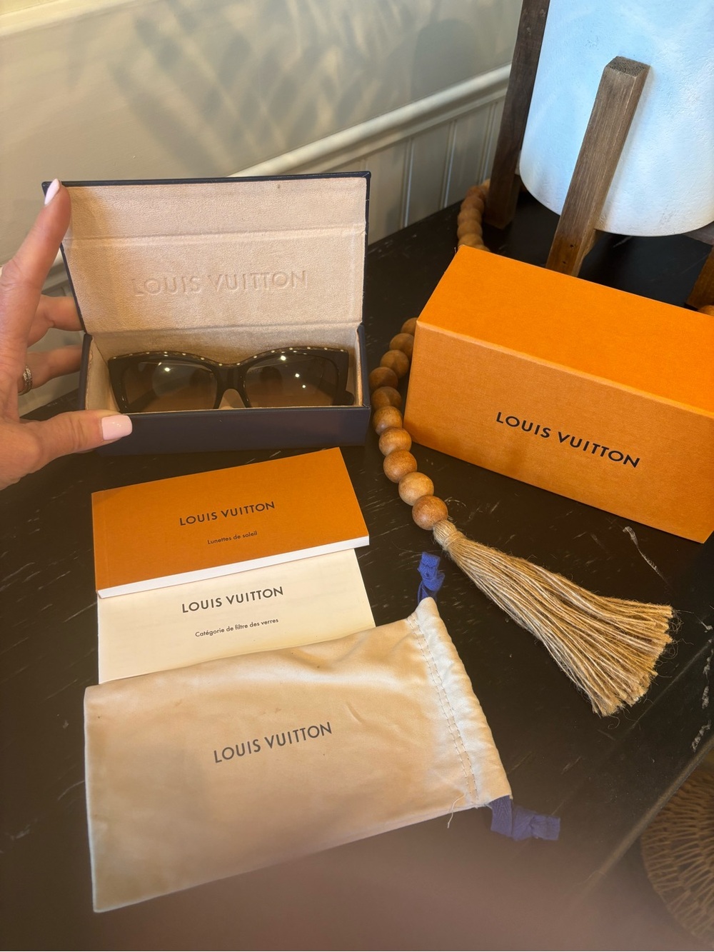 Louis Vuitton brown cat-eye sunglasses with gold stud accents. - Picture 3 of 12